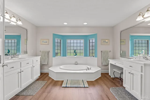 a view of a swimming pool with a sitting space