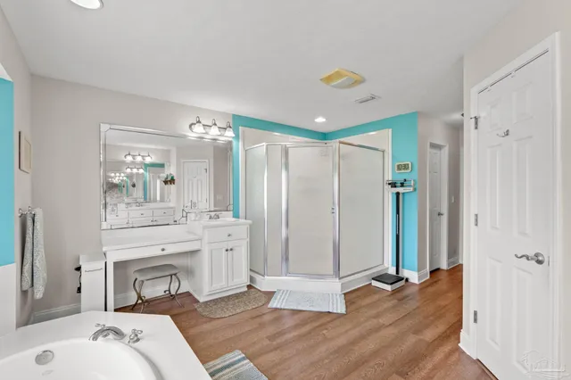 a view of a park with sitting area and garden