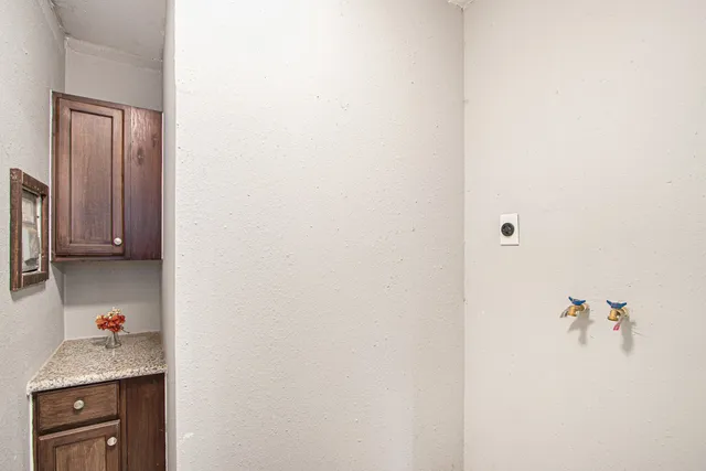 a house with a tree in the background