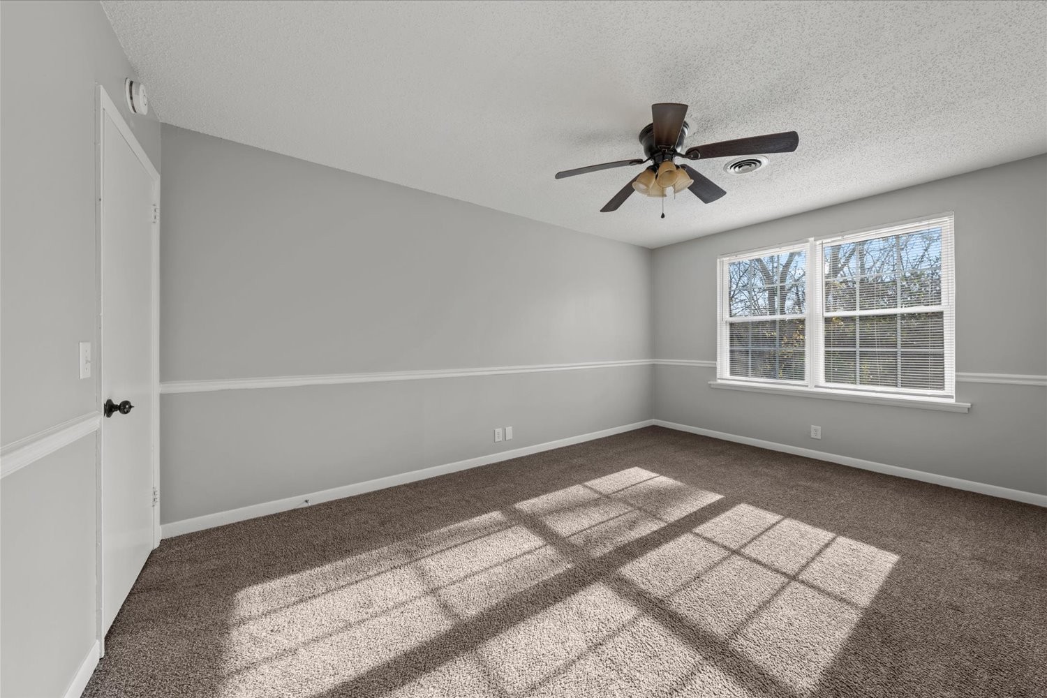 441 Harding Place, Unit A12 Nashville, TN 37211 - Photo 16 of 21 a view of a livingroom with a ceiling fan and window