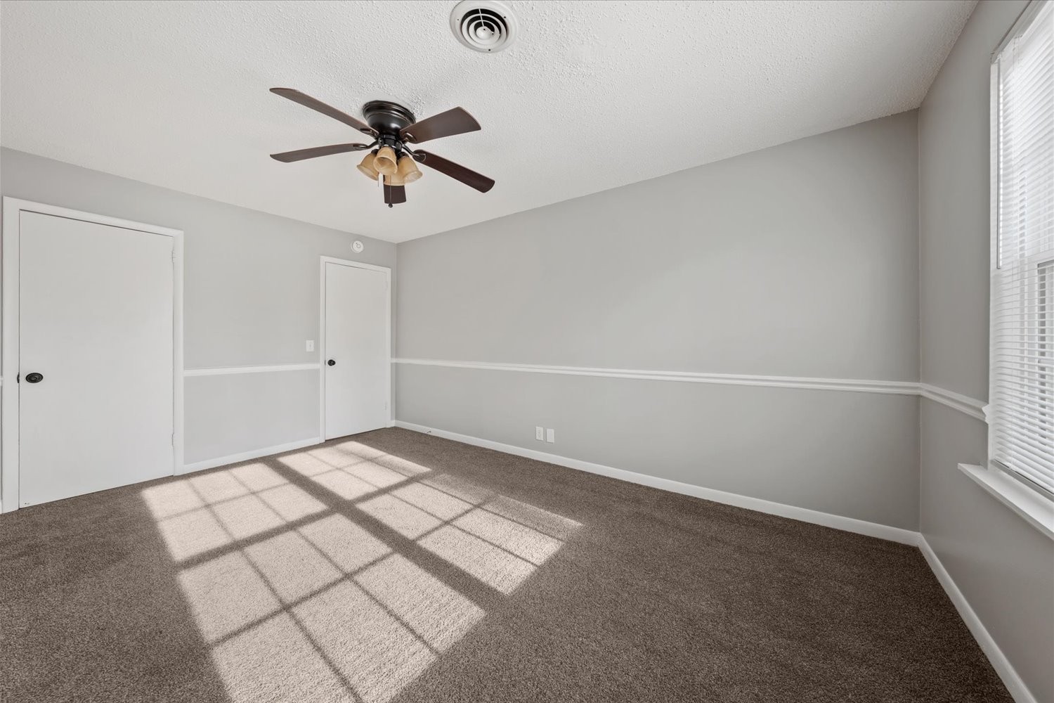 441 Harding Place, Unit A12 Nashville, TN 37211 - Photo 18 of 21 a view of a room with a ceiling fan and window
