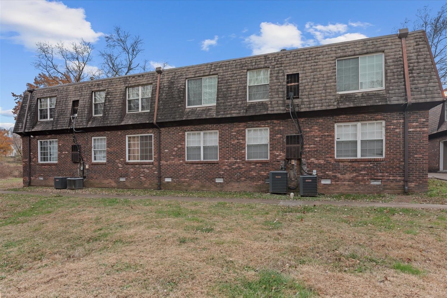 441 Harding Place, Unit A12 Nashville, TN 37211 - Photo 20 of 21 a view of a house with a yard