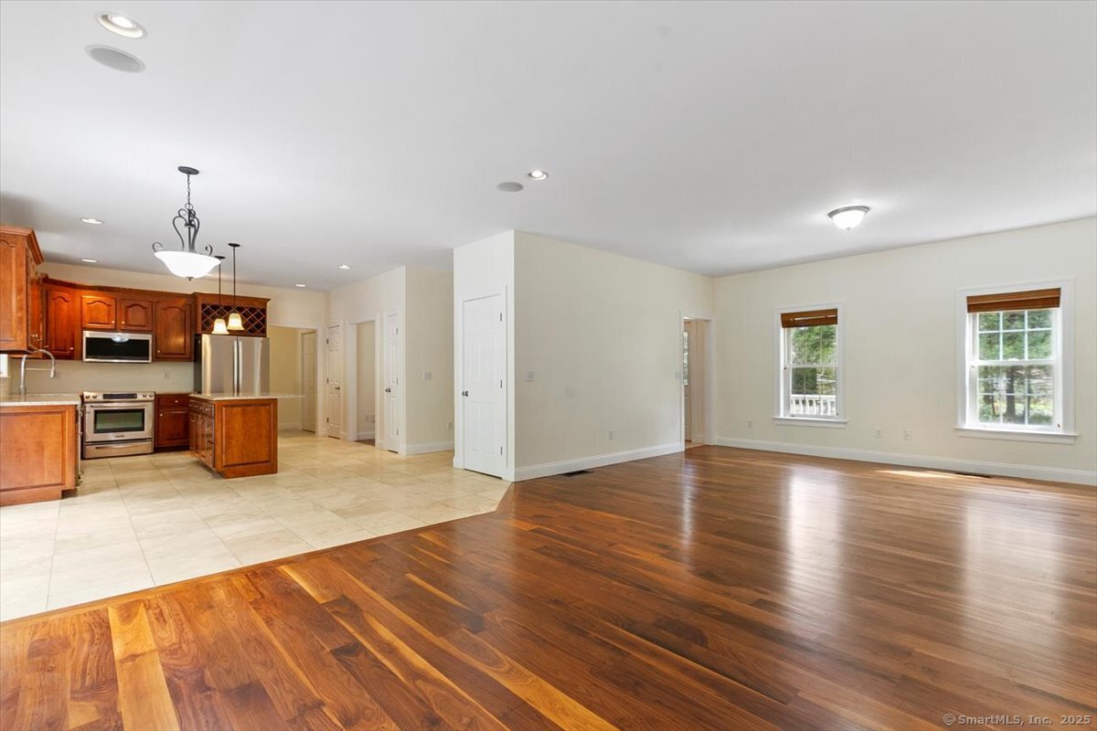 151 Losaw Road Winchester, CT 06021 - Photo 11 of 40 a view of a kitchen with a sink and a refrigerator