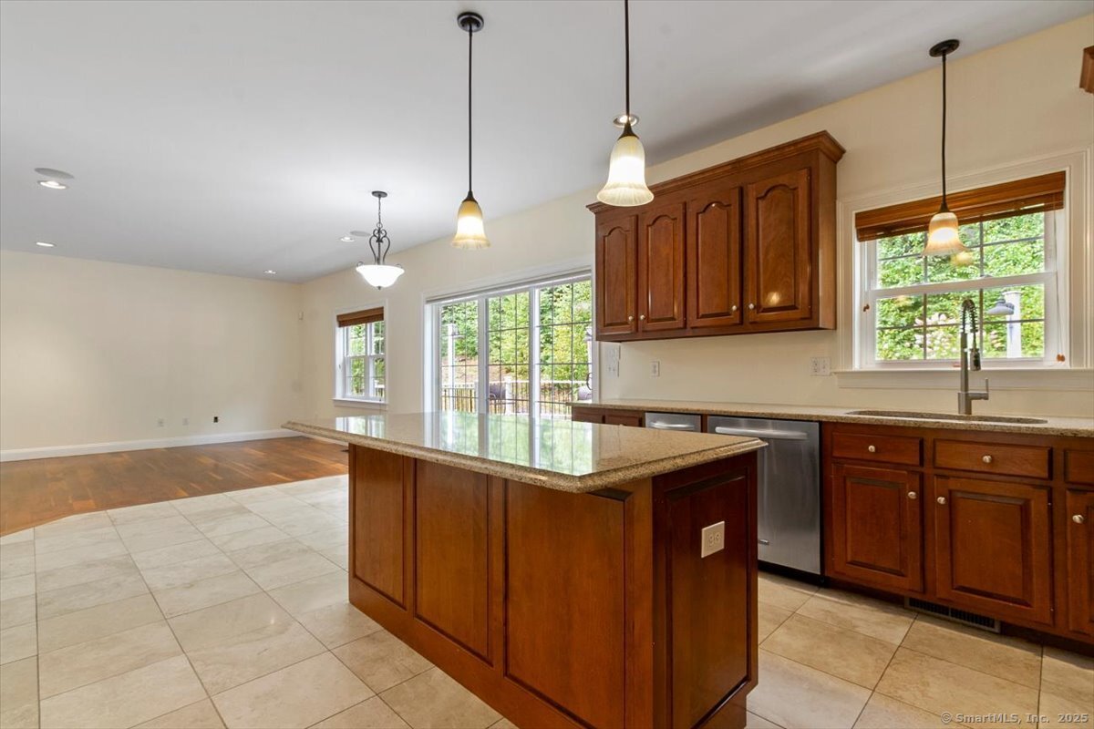 151 Losaw Road Winchester, CT 06021 - Photo 13 of 40 a kitchen with stainless steel appliances granite countertop a sink and a window