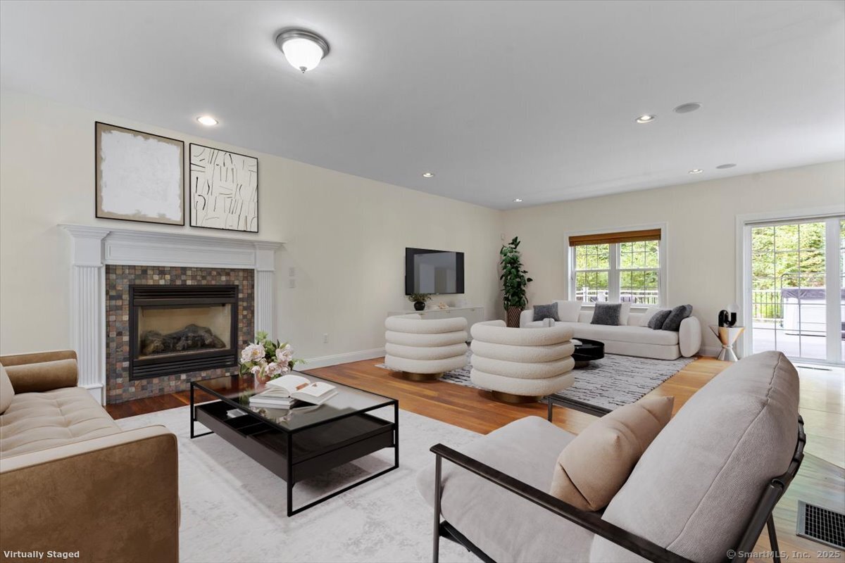 151 Losaw Road Winchester, CT 06021 - Photo 7 of 40 a living room with fireplace furniture and a fireplace
