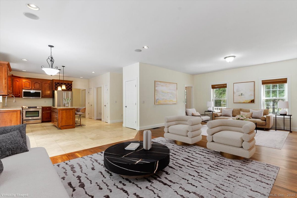 151 Losaw Road Winchester, CT 06021 - Photo 10 of 40 a living room with furniture and a wooden floor
