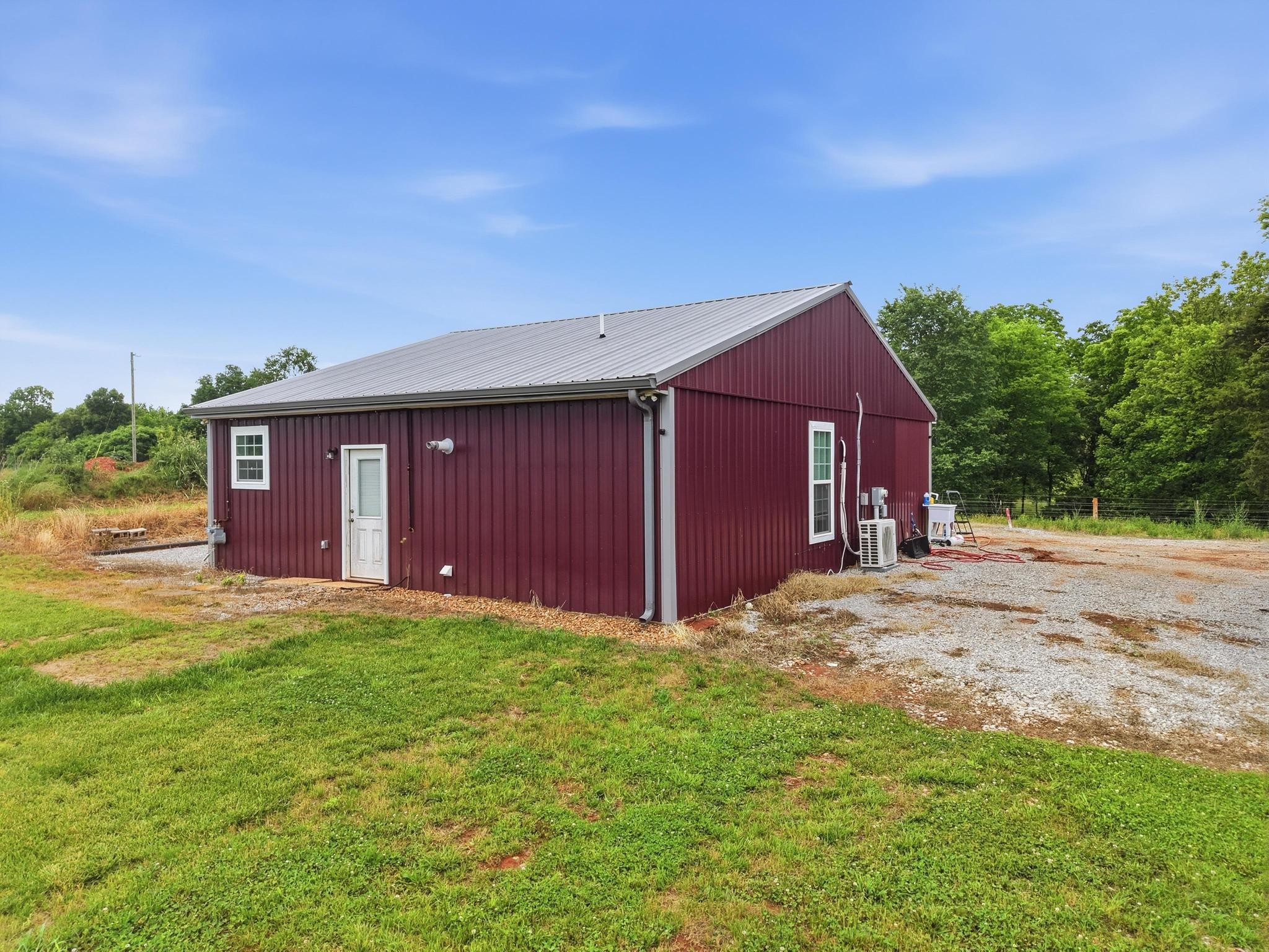 1050 Franks Ferry Road Sparta, TN 38583 - Photo 26 of 35 a front view of a house with a yard