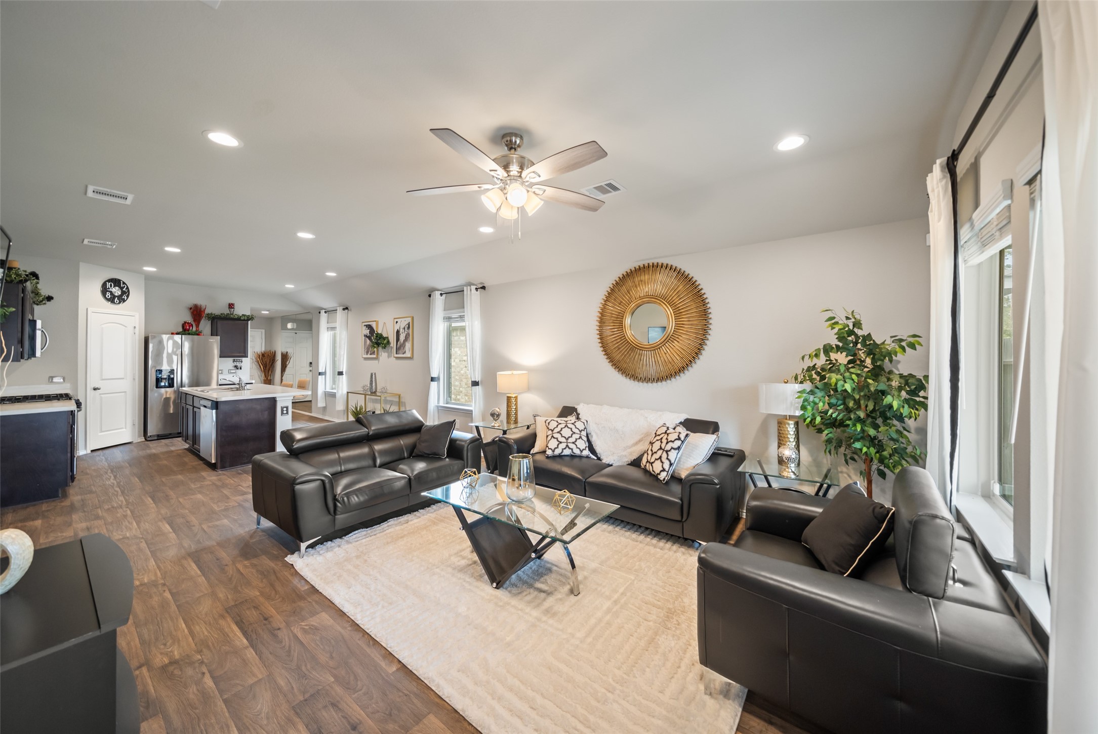 22806 Spruce Summit Trail Spring, TX 77373 - Photo 11 of 31 a living room with furniture a clock and a window
