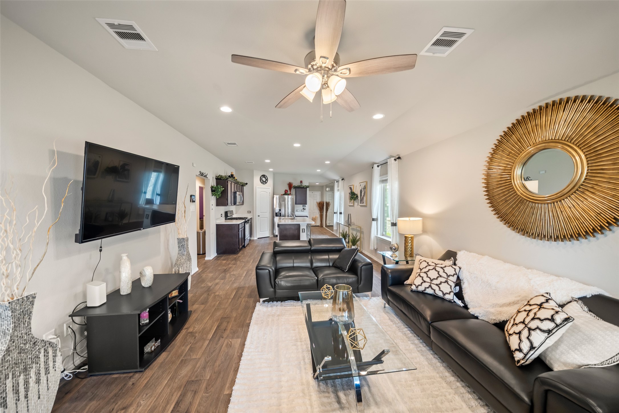 22806 Spruce Summit Trail Spring, TX 77373 - Photo 12 of 31 a living room with furniture and a flat screen tv