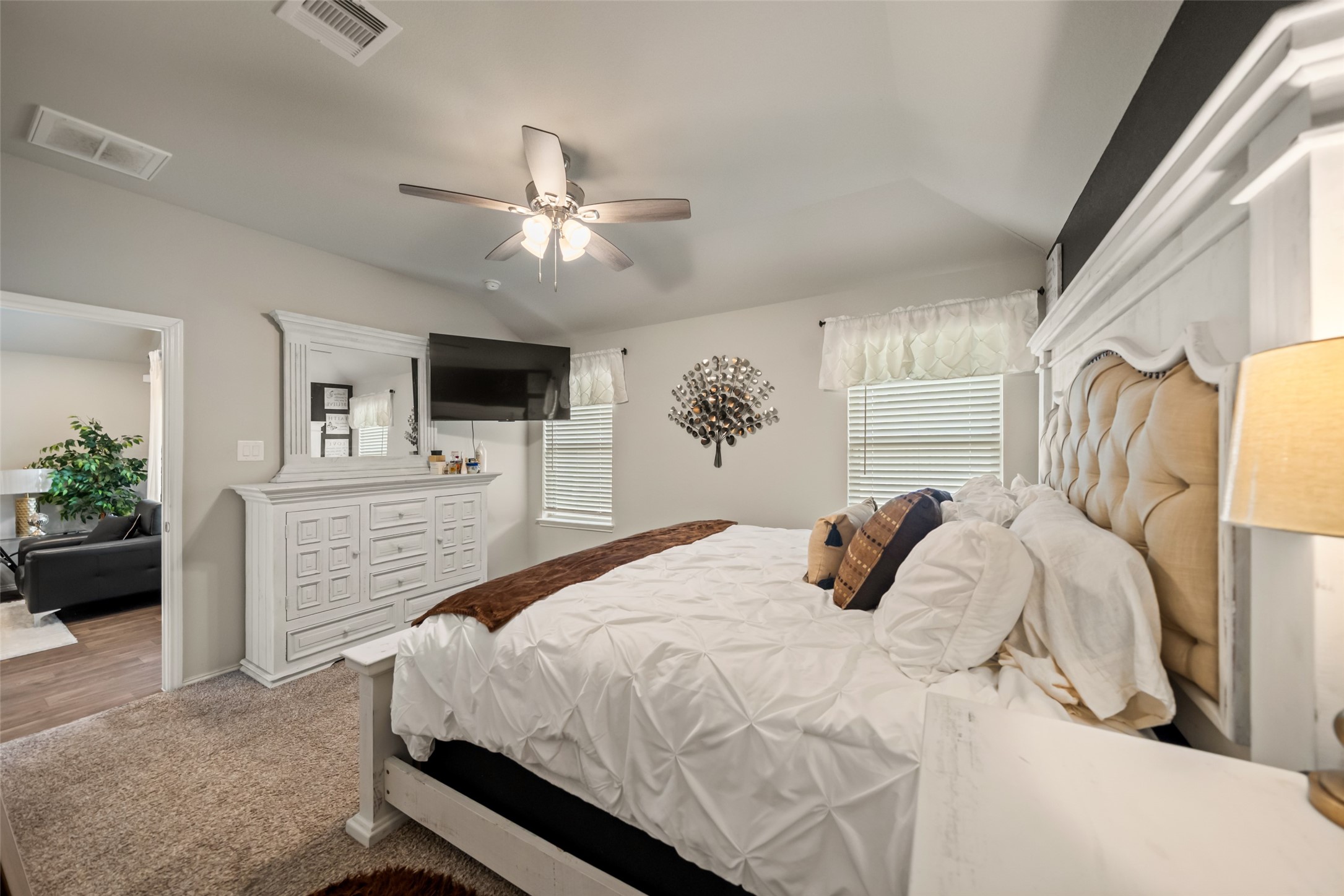 22806 Spruce Summit Trail Spring, TX 77373 - Photo 14 of 31 a bedroom with a large bed and a flat screen tv