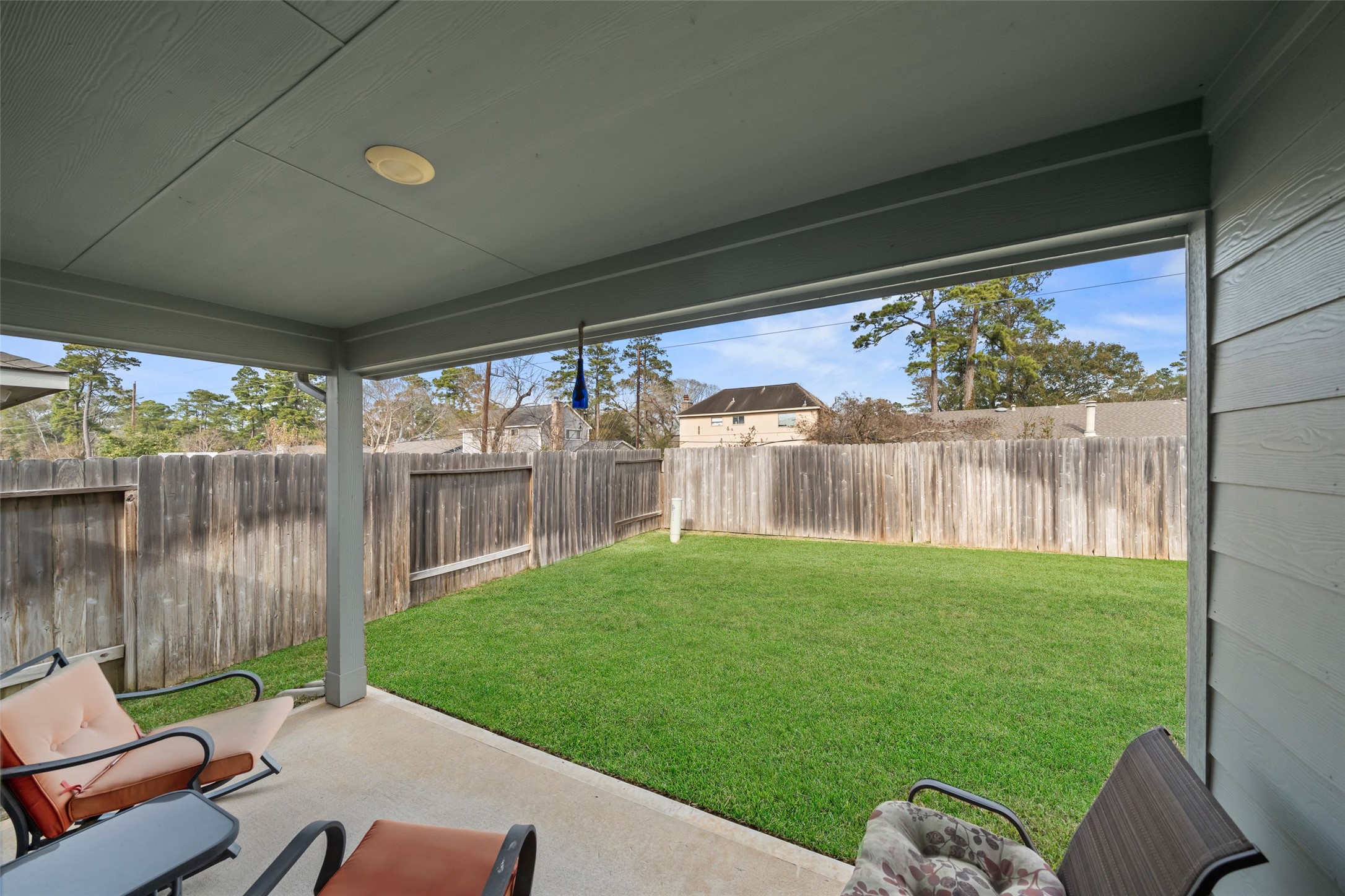 22806 Spruce Summit Trail Spring, TX 77373 - Photo 21 of 31 a view of backyard with a swimming pool and furniture