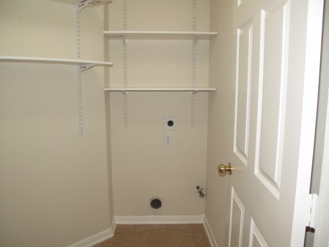 3142 Rendezvous Court Spring, TX 77373 - Photo 24 of 30 a bathroom with a glass shower door