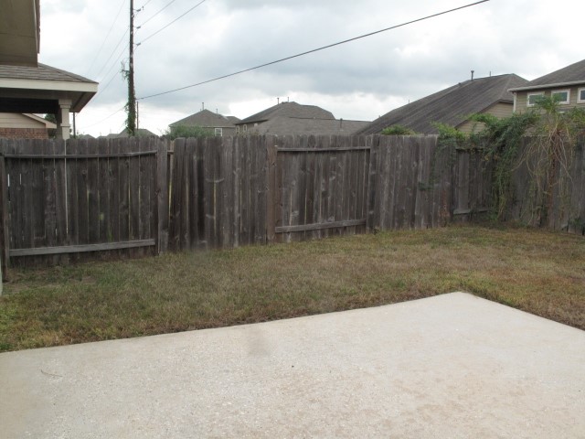 3142 Rendezvous Court Spring, TX 77373 - Photo 27 of 30 a backyard of a house