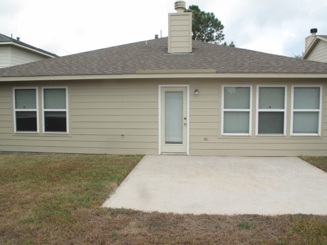 3142 Rendezvous Court Spring, TX 77373 - Photo 28 of 30 a front view of a house with large windows