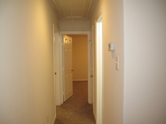 3142 Rendezvous Court Spring, TX 77373 - Photo 9 of 30 a view of a bathroom from a hallway