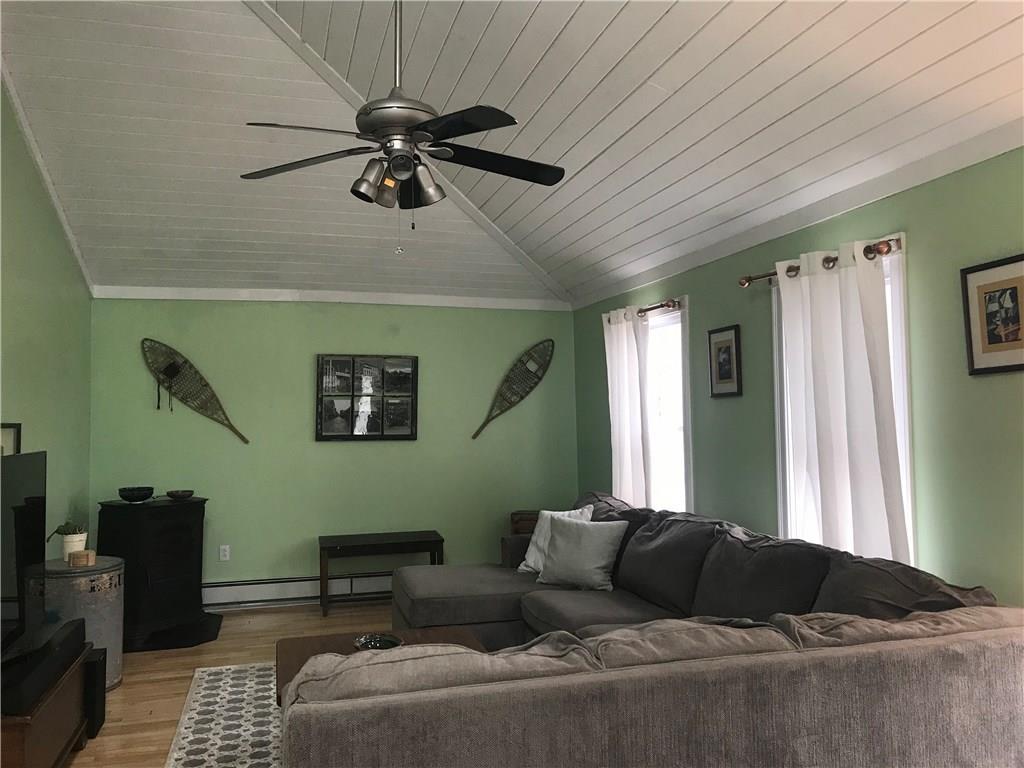 Enter into a spacious living room...