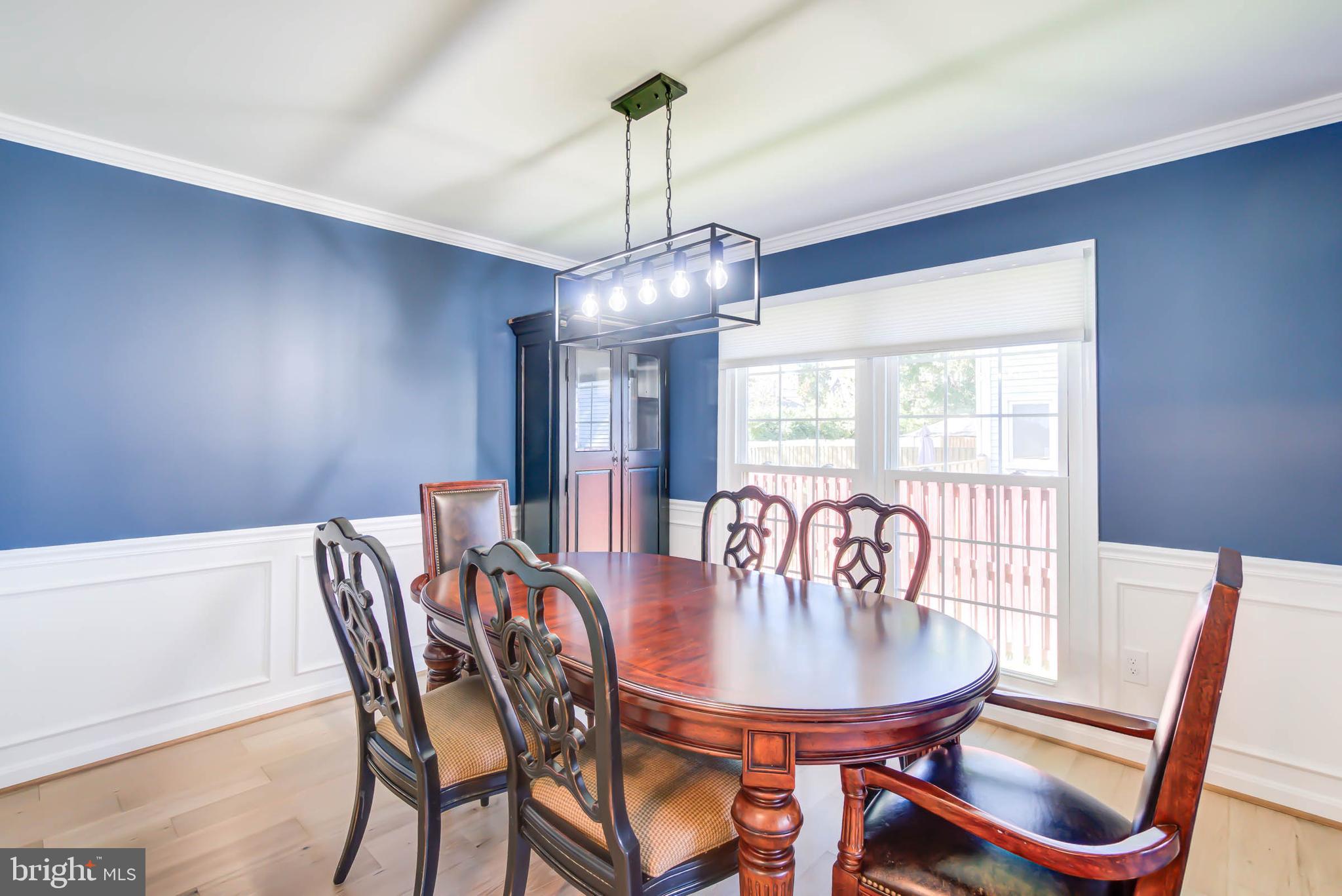 6617 Morning Ride Circle Alexandria, VA 22315 - Photo 12 of 51 a view of a dining room with furniture window and outside view