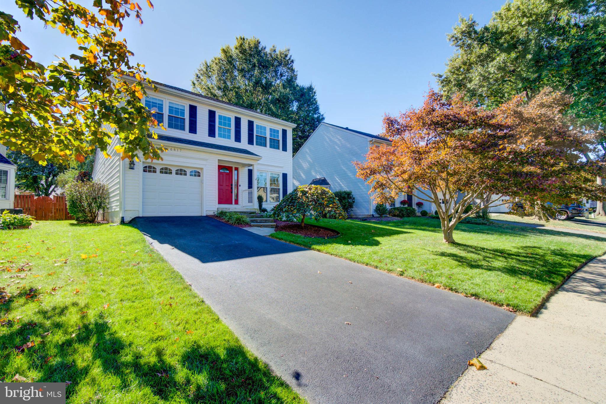 6617 Morning Ride Circle Alexandria, VA 22315 - Photo 3 of 51 a front view of house with yard
