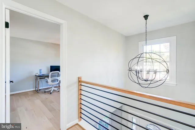 a workspace with furniture and a window