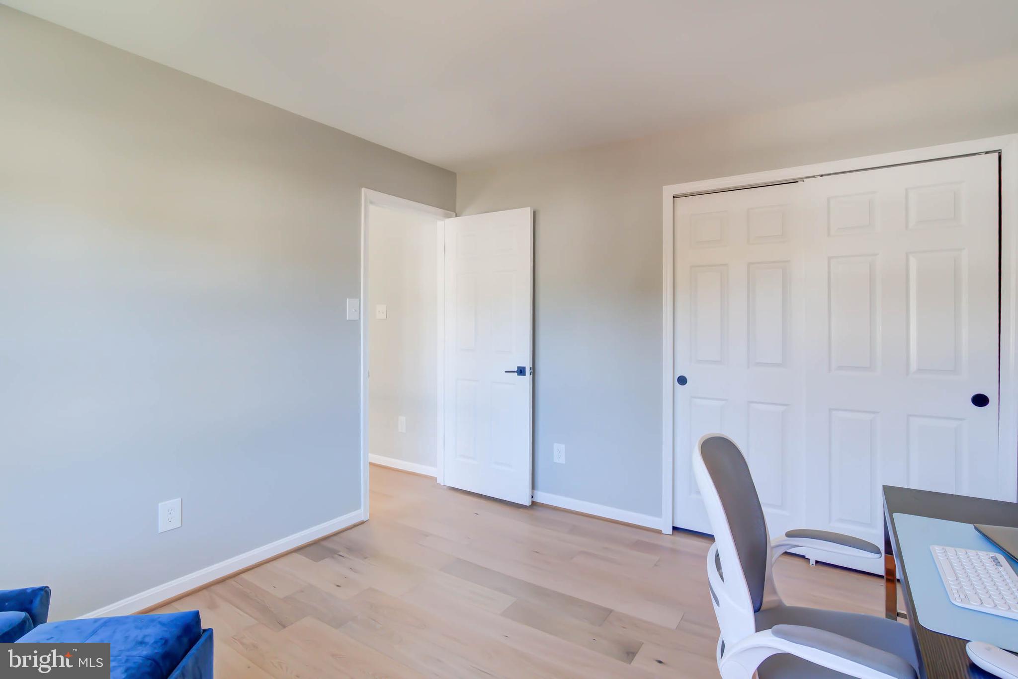 6617 Morning Ride Circle Alexandria, VA 22315 - Photo 41 of 51 a view of room with wooden floor and chair