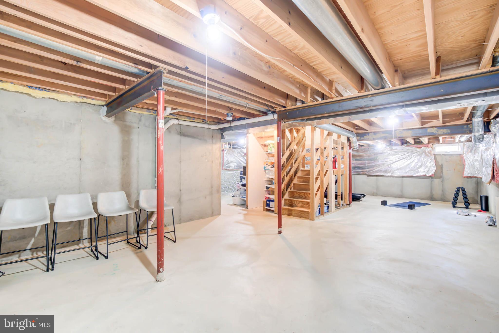 6617 Morning Ride Circle Alexandria, VA 22315 - Photo 43 of 51 a view of a room with table and chairs