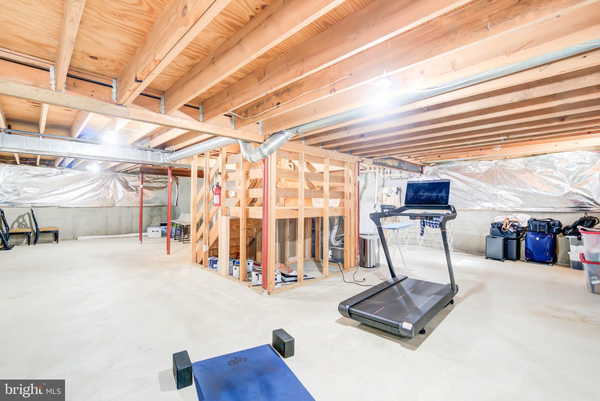 6617 Morning Ride Circle Alexandria, VA 22315 - Photo 45 of 51 a view of a room with gym equipment