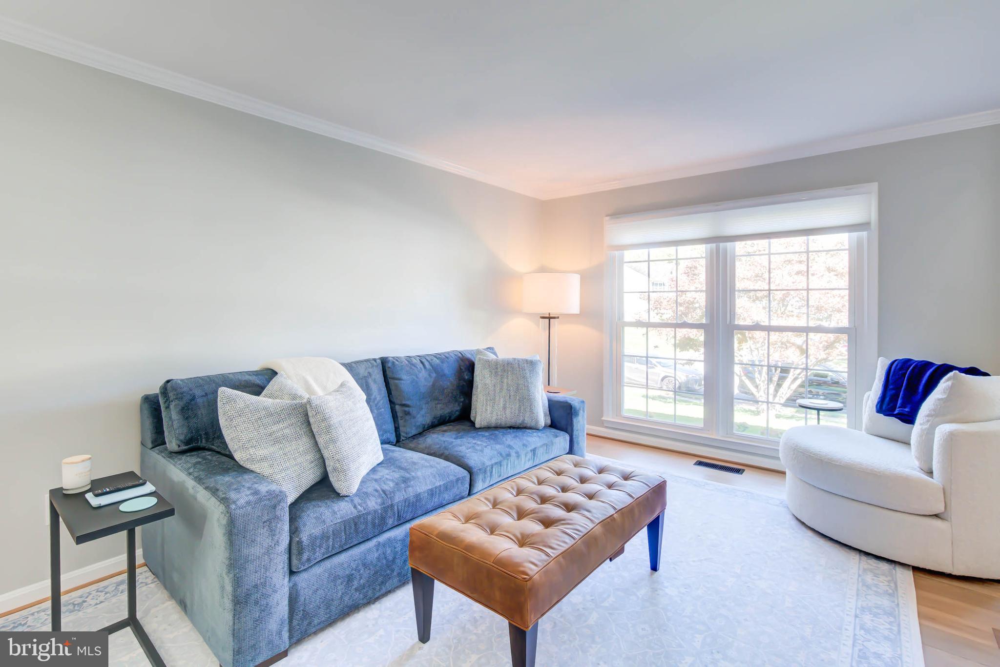 6617 Morning Ride Circle Alexandria, VA 22315 - Photo 9 of 51 a living room with furniture and a window