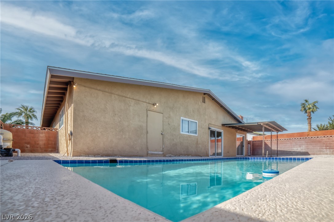 3556 Ruth Drive Las Vegas, NV 89121 - Photo 21 of 21 Cool off in this backyard oasis, featuring a glistening in-ground pool, perfect for leisure.