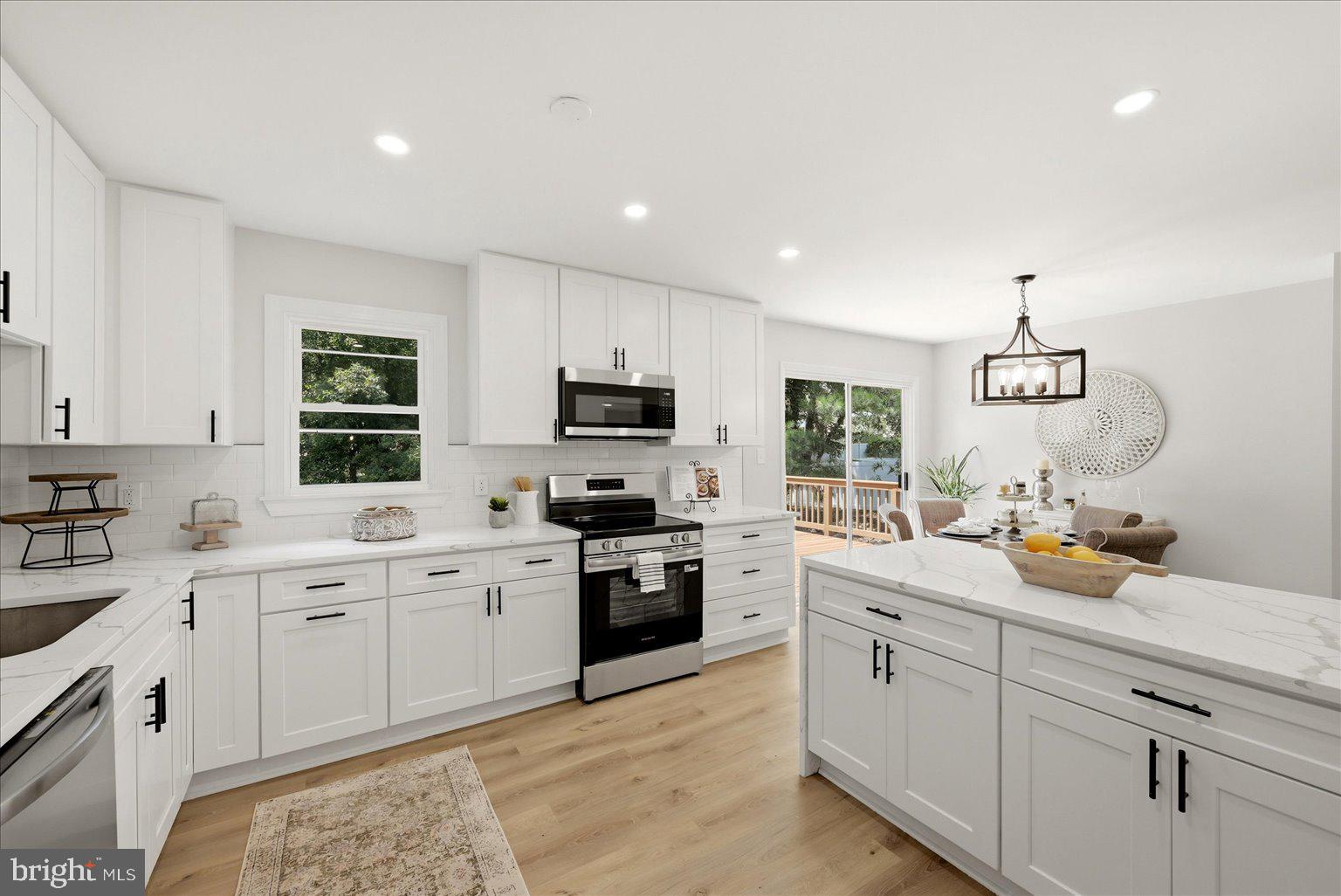 9309 Cross Bow Road Fort Washington, MD 20744 - Photo 10 of 53 Bright and airy modern kitchen space.