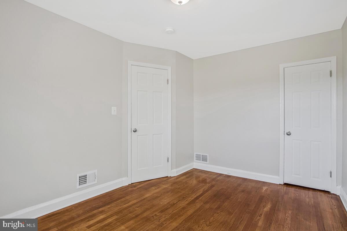 8352 Kavanagh Road Dundalk, MD 21222 - Photo 16 of 32 a view of room with wooden floor