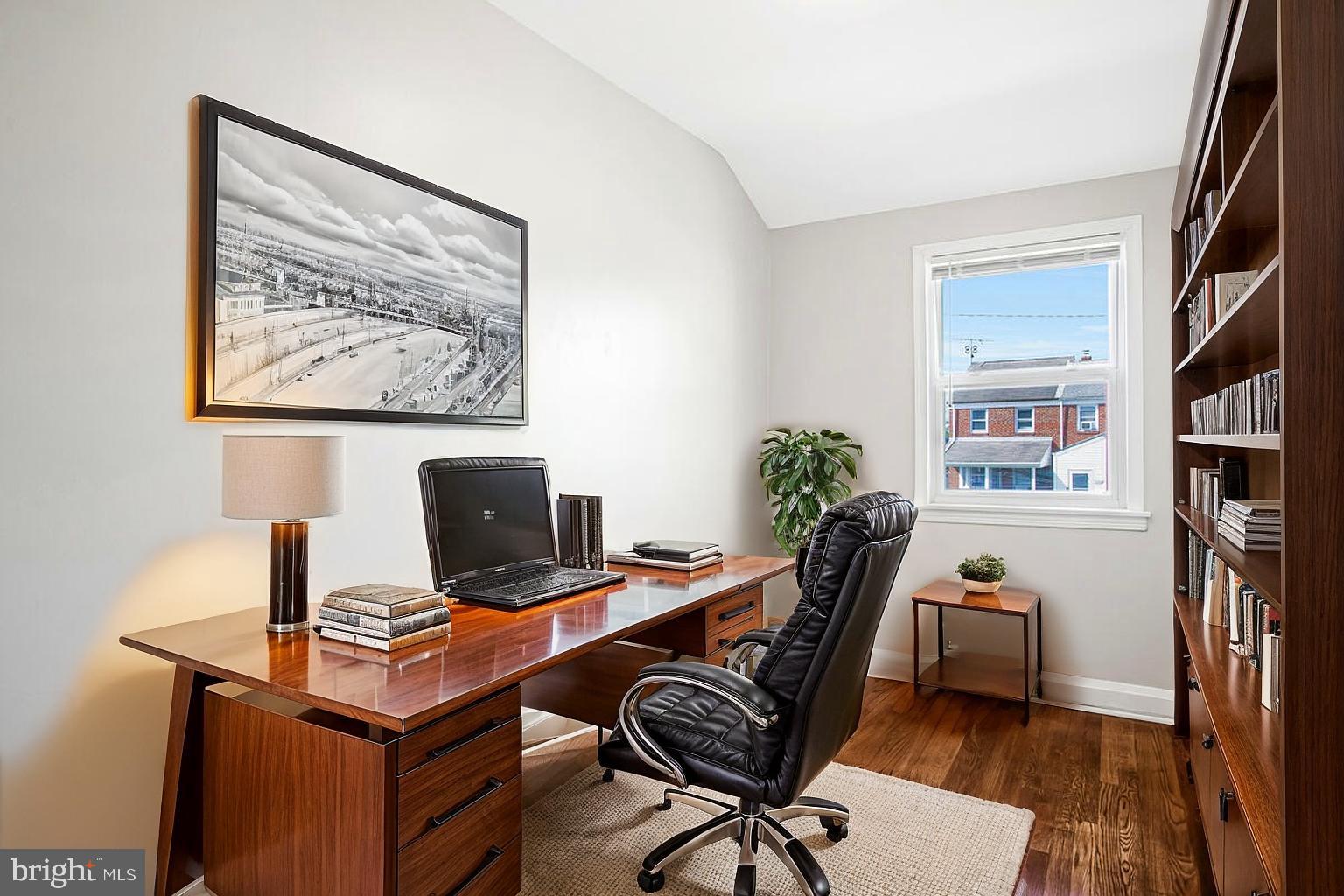 8352 Kavanagh Road Dundalk, MD 21222 - Photo 19 of 32 a view of a workspace with furniture and a window