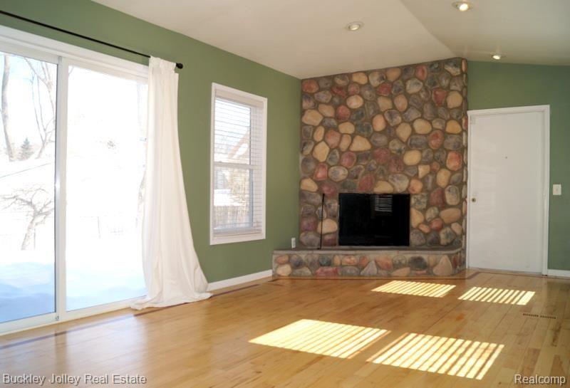951 Brighton Lake Road Brighton, MI 48116 - Photo 7 of 19 Beautiful Stone Natural Fireplace.jpg