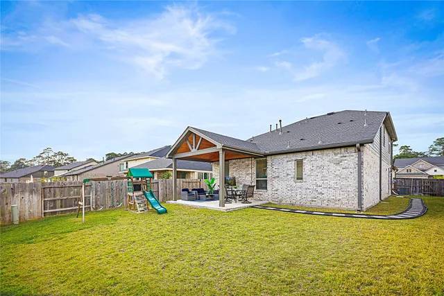 a bed room with a bed and a window
