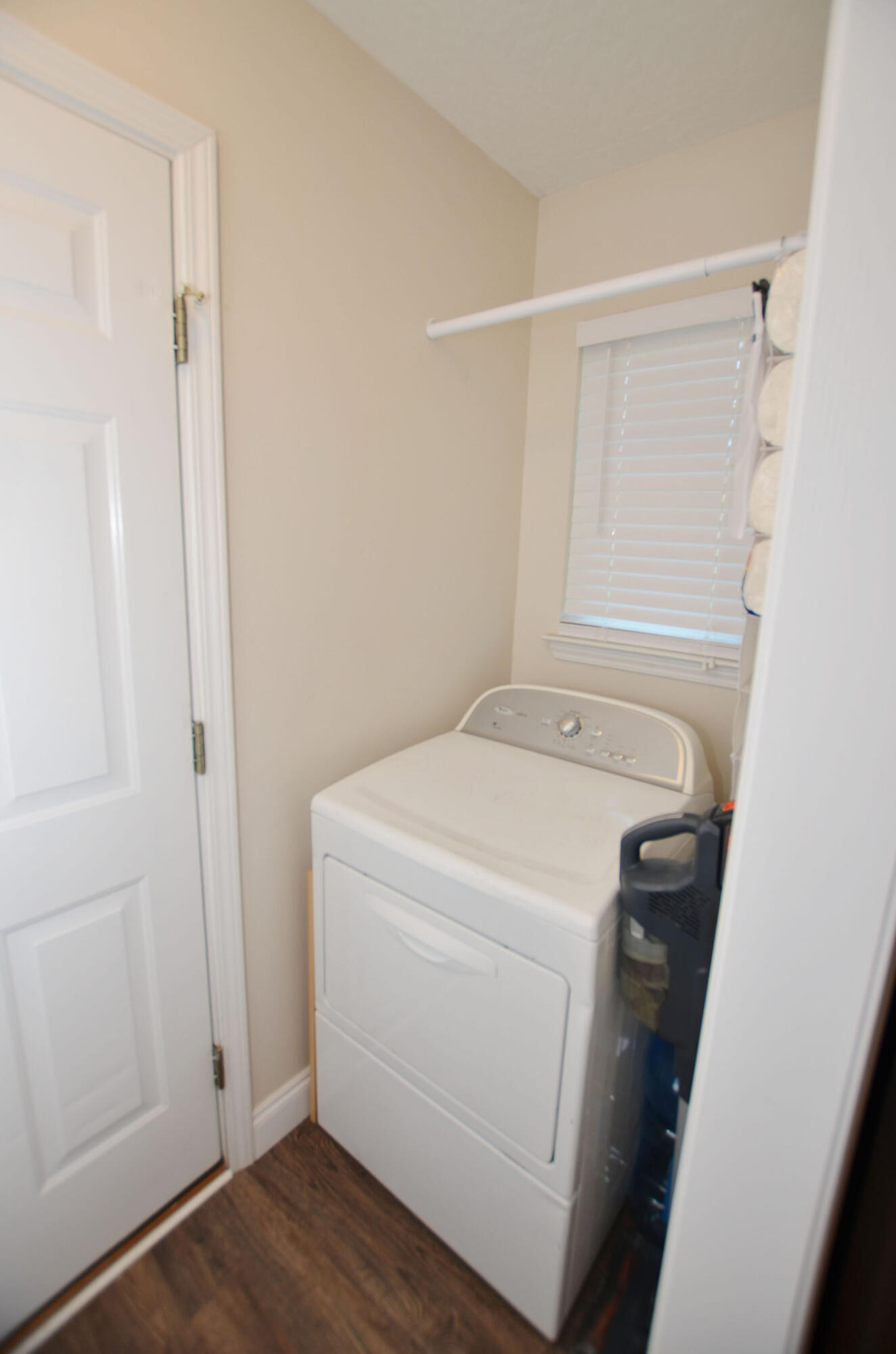 8271 Tavira Street Navarre, FL 32566 - Photo 21 of 60 a utility room with dryer and washer