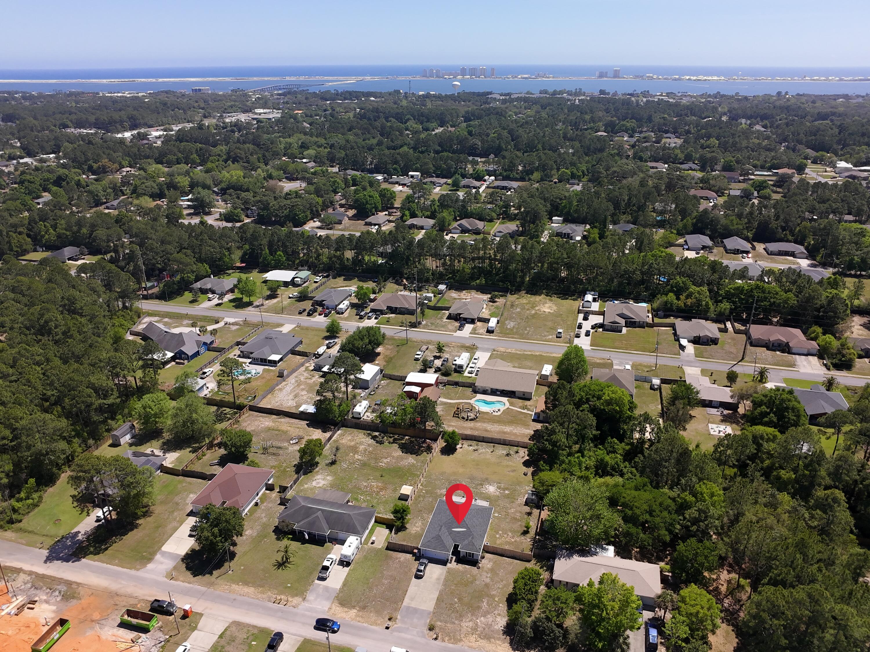 8271 Tavira Street Navarre, FL 32566 - Photo 3 of 60 an aerial view of a city