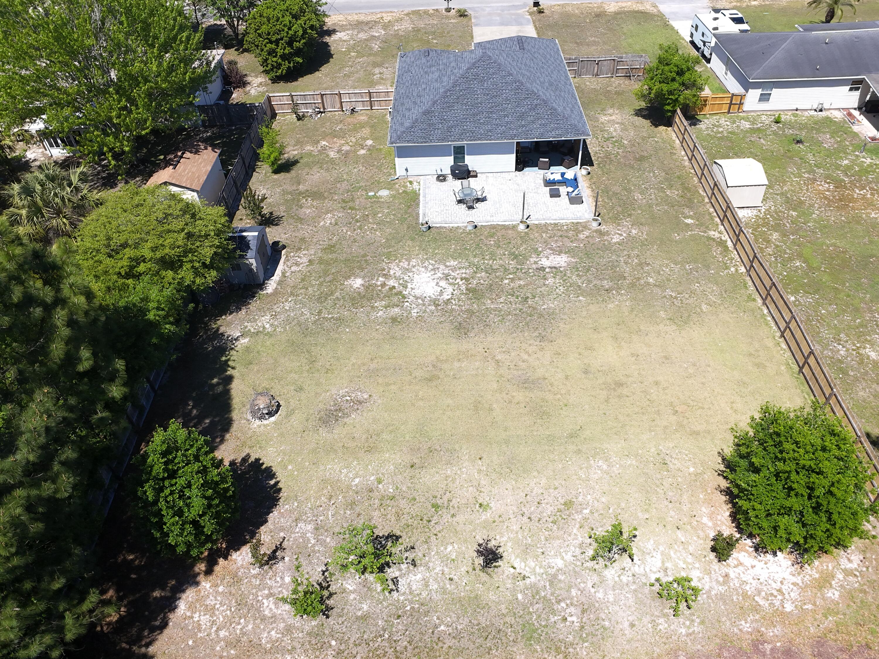 8271 Tavira Street Navarre, FL 32566 - Photo 56 of 60 an aerial view of a house