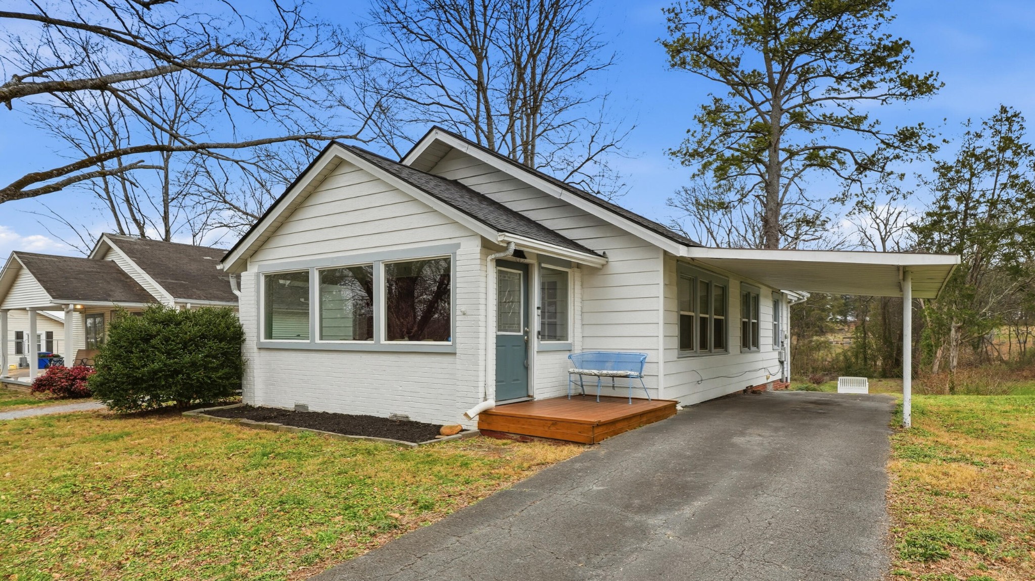 front view of a house with a yard