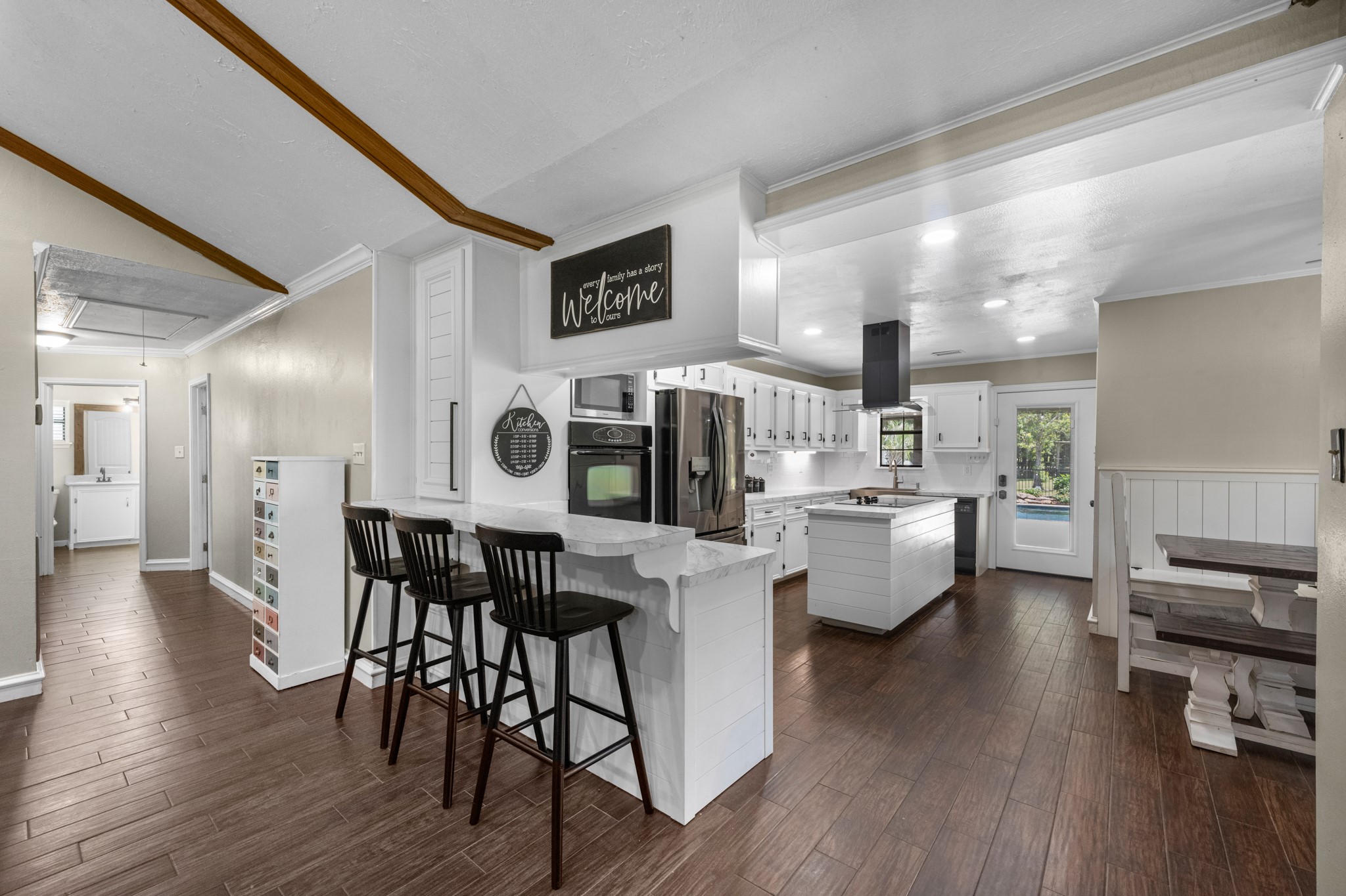 22698 Brook Forest Road New Caney, TX 77357 - Photo 15 of 46 Open kitchen and dining spaces flow easily together for everyday living & entertaining!