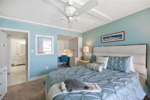 a bathroom with a double vanity sink mirror and toilet