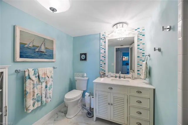 a view of storage and utility room with washer and dryer