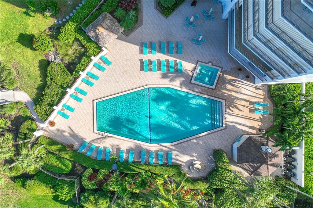 840 South Collier Boulevard, Unit 1104 Marco Island, FL 34145 - Photo 41 of 50 a backyard of a house with lots of green space