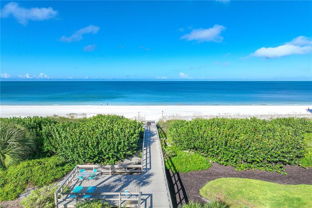 840 South Collier Boulevard, Unit 1104 Marco Island, FL 34145 - Photo 48 of 50 a view of a yard with an ocean view