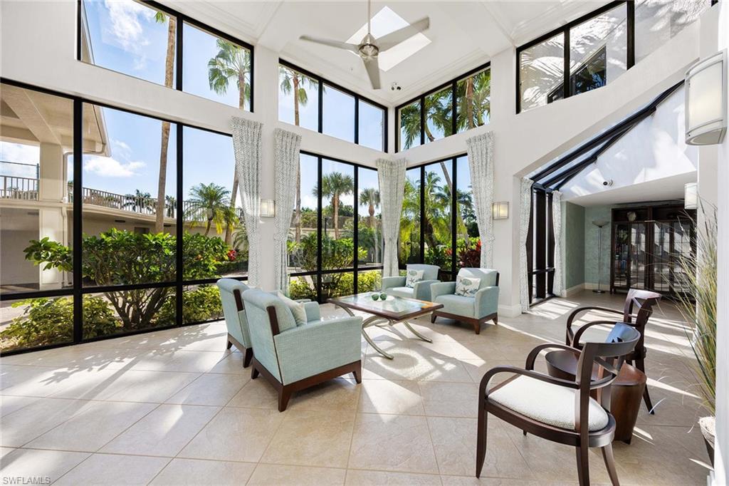 840 South Collier Boulevard, Unit 1104 Marco Island, FL 34145 - Photo 5 of 50 a building outdoor space with couches and potted plants