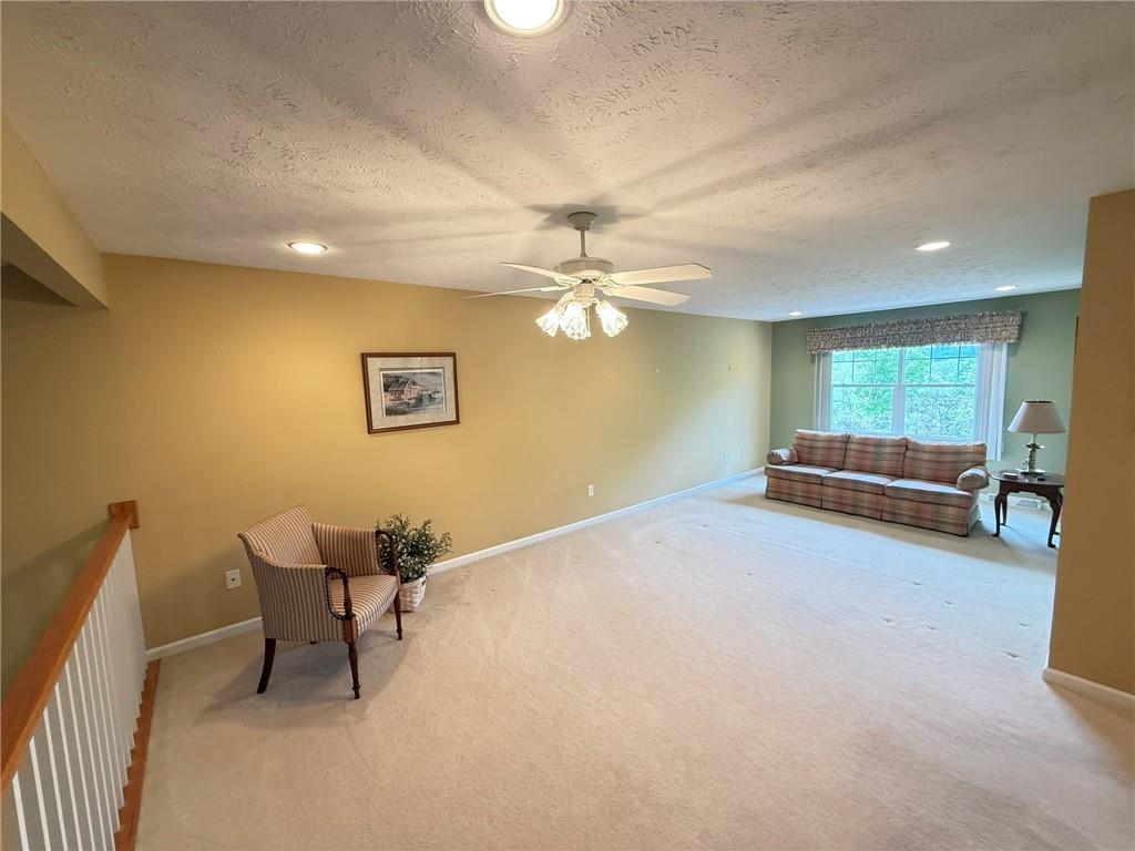 411 Chestnut Lane Apollo, PA 15613 - Photo 18 of 38 a living room with furniture and a ceiling fan