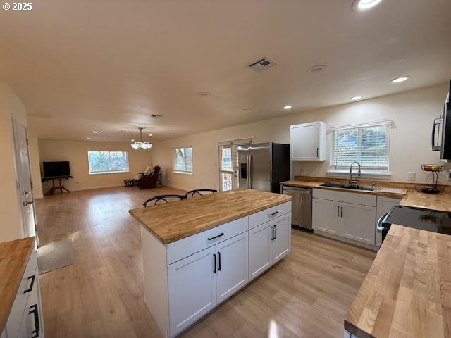 575 Cedar Street Sutherlin, OR 97479 - Photo 12 of 47 a kitchen with stainless steel appliances granite countertop a stove a sink a refrigerator and a oven