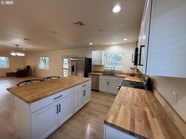 575 Cedar Street Sutherlin, OR 97479 - Photo 14 of 47 a kitchen with sink stove and refrigerator