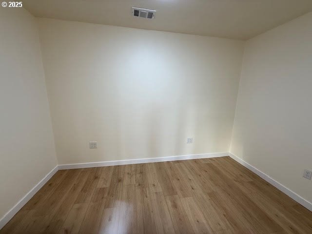 575 Cedar Street Sutherlin, OR 97479 - Photo 27 of 47 a view of an empty room with wooden floor