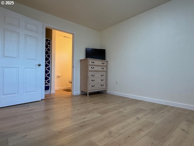 575 Cedar Street Sutherlin, OR 97479 - Photo 30 of 47 a view of an empty room with closet and wooden floor