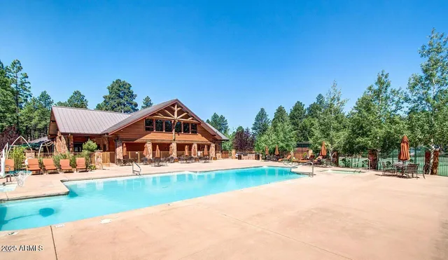 a house with palm tree in the background