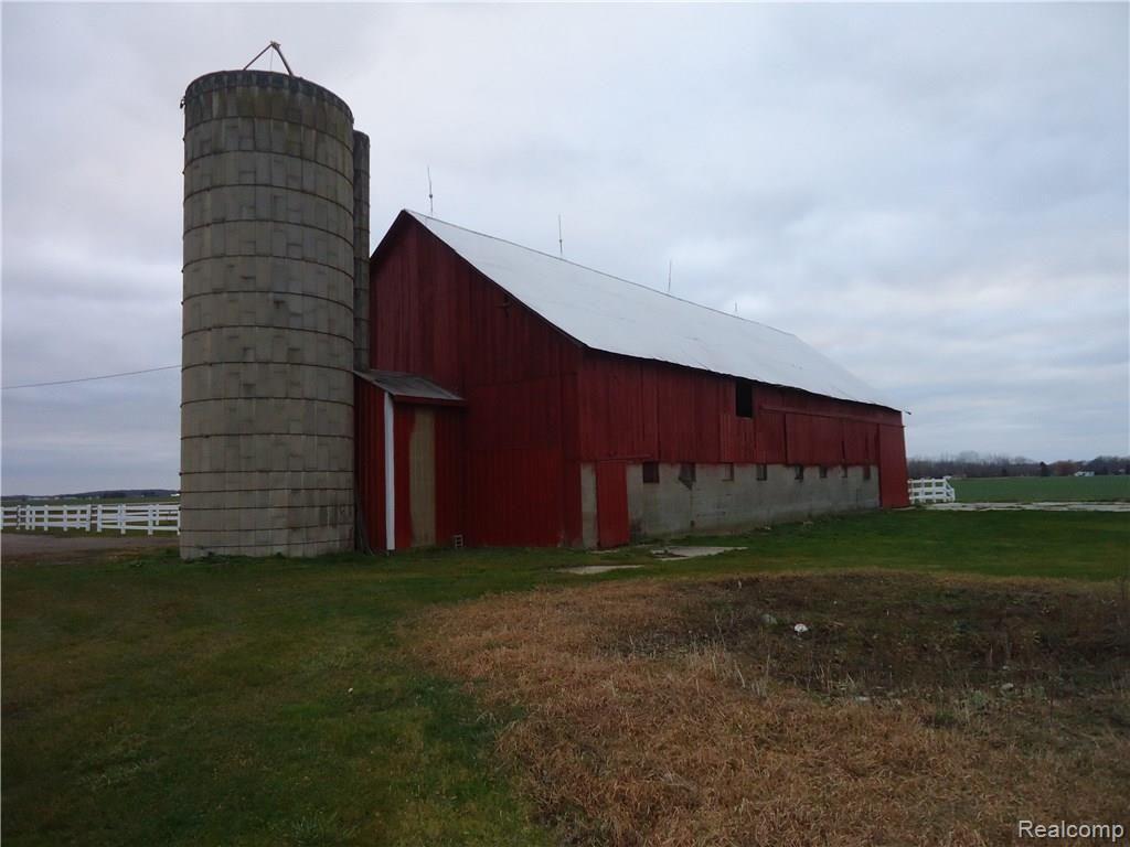 761 East Peck Road Peck, MI 48466 - Photo 5 of 11 fence & barn back.JPG